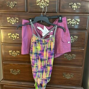 Women’s Dolfin Uglies one piece racer back swimsuit, matching swim shorts